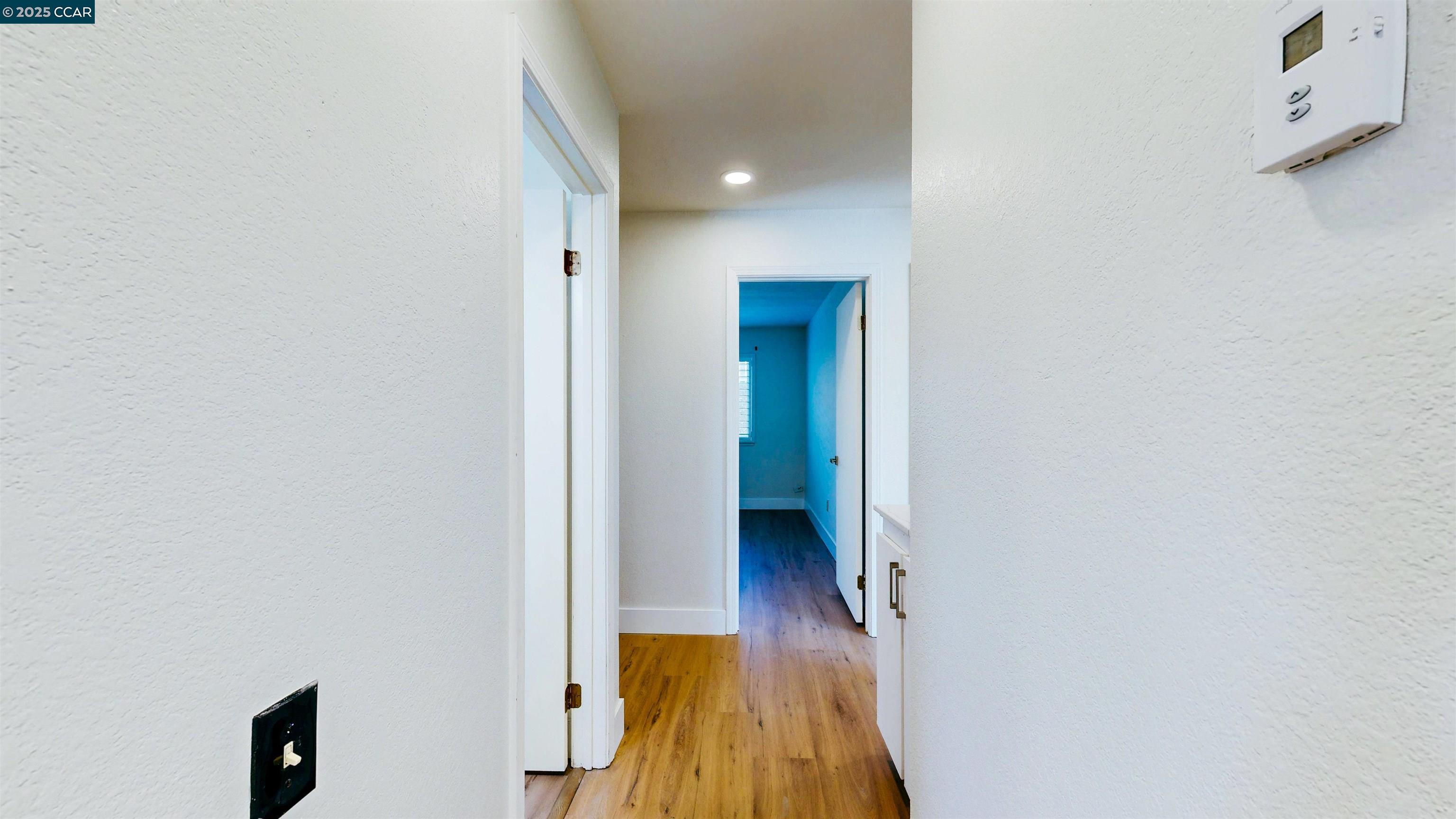 3743 Painted Pony Road Richmond, CA 94803 - Photo 29 of 56 a view of a hallway with a white walls