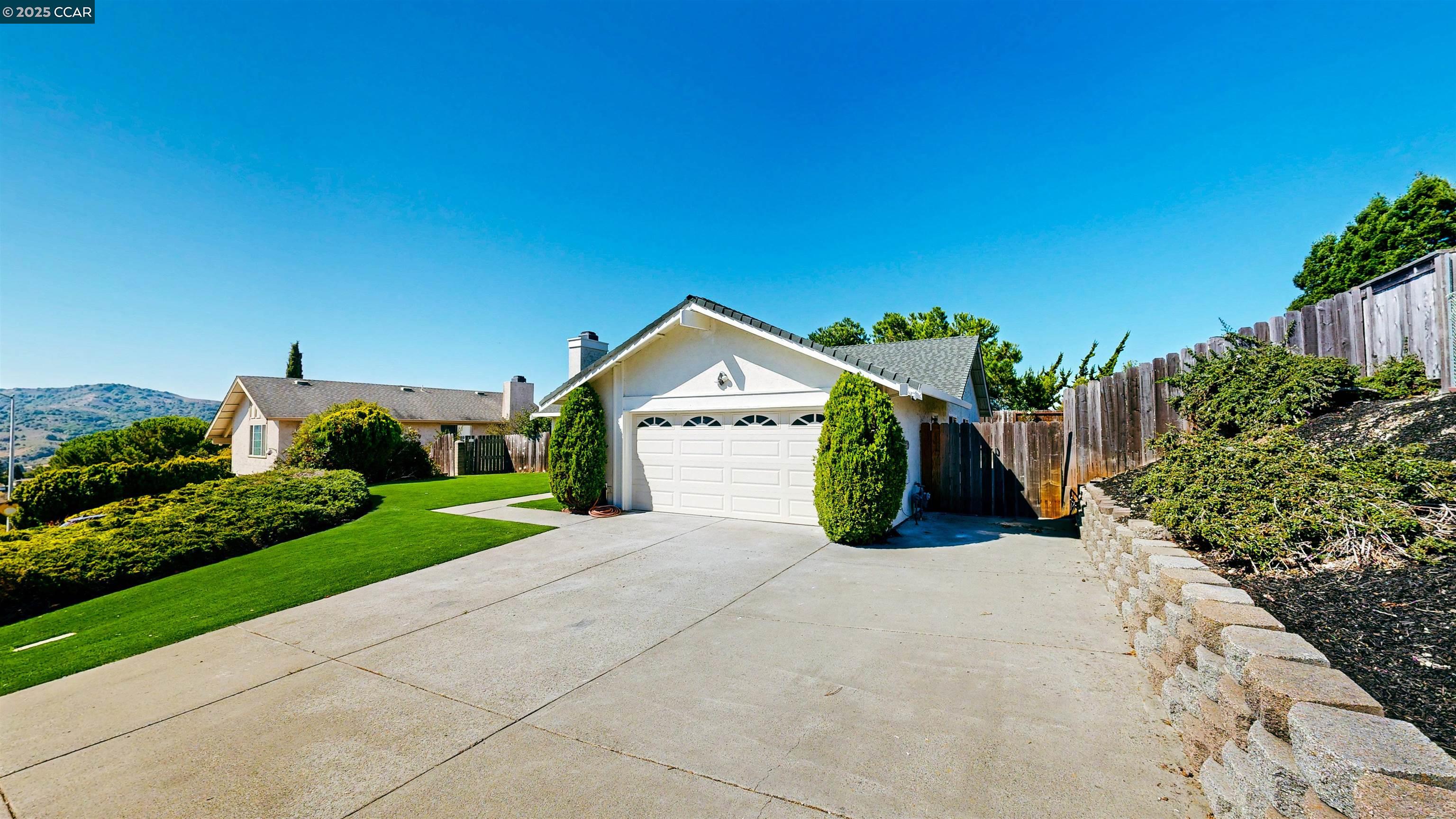 3743 Painted Pony Road Richmond, CA 94803 - Photo 4 of 56 a view of a house with a yard and potted plants