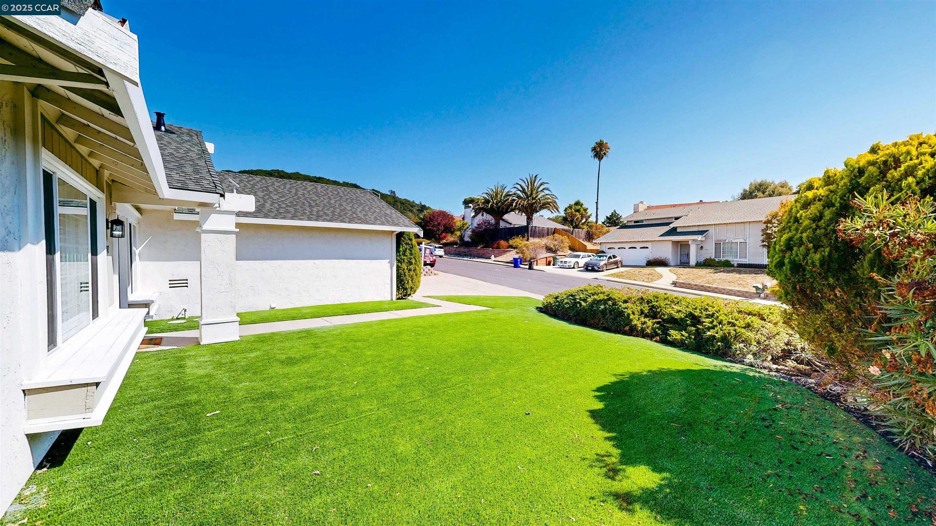 3743 Painted Pony Road Richmond, CA 94803 - Photo 7 of 56 a front view of a house with a garden and sitting area