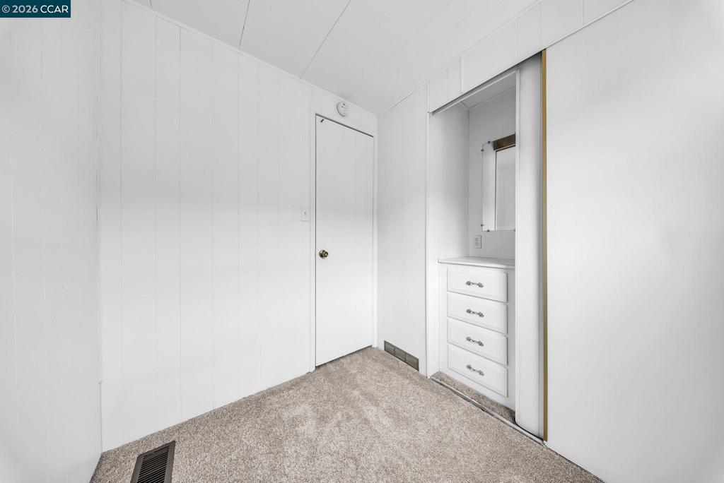 3466 Willow Pass Road Concord, CA 94519 - Photo 17 of 24 a view of room with cabinet and mirrors