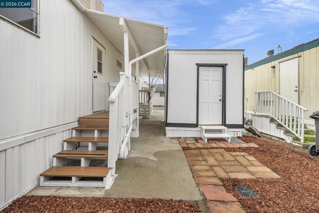 3466 Willow Pass Road Concord, CA 94519 - Photo 19 of 24 a view of entryway and hall with wooden floor