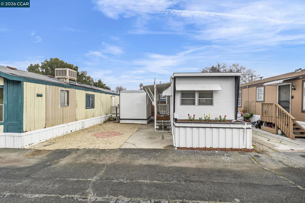 3466 Willow Pass Road Concord, CA 94519 - Photo 2 of 24 a view of a house with backyard and roof