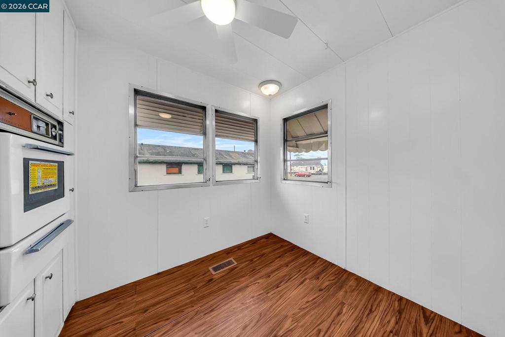 3466 Willow Pass Road Concord, CA 94519 - Photo 5 of 24 a view of empty room with window and fireplace