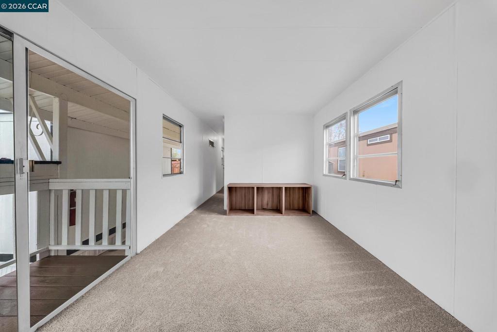 3466 Willow Pass Road Concord, CA 94519 - Photo 7 of 24 a view of an empty room with stairs