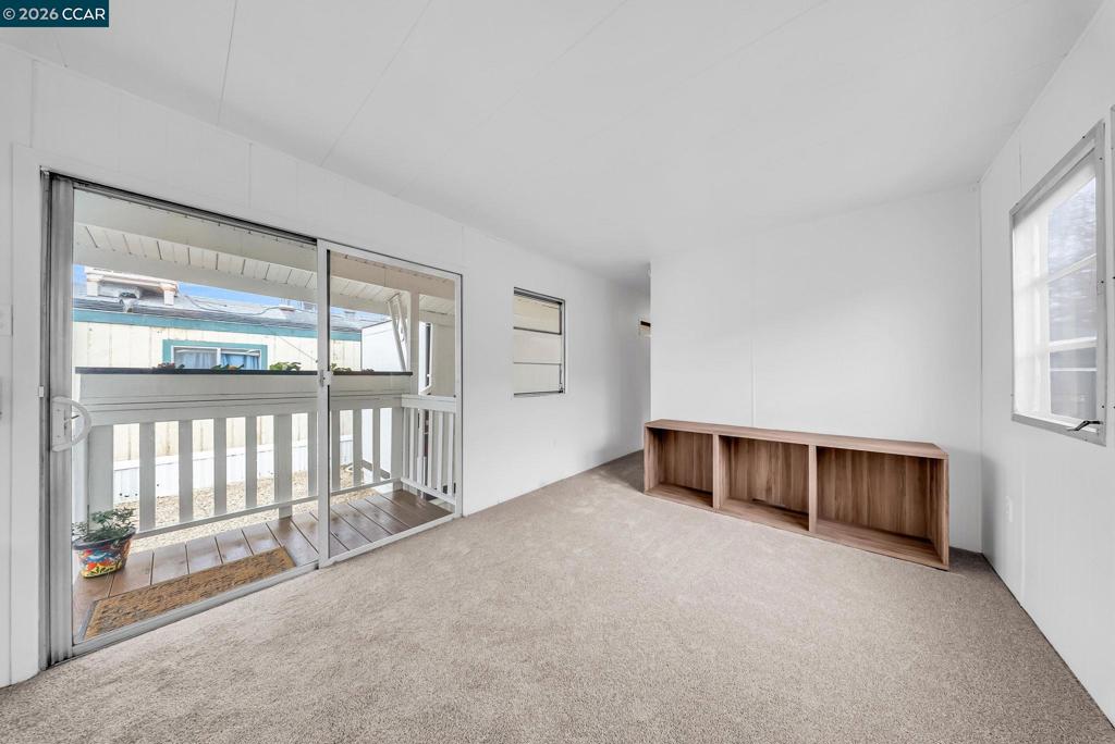 3466 Willow Pass Road Concord, CA 94519 - Photo 10 of 24 a big room with windows and closet