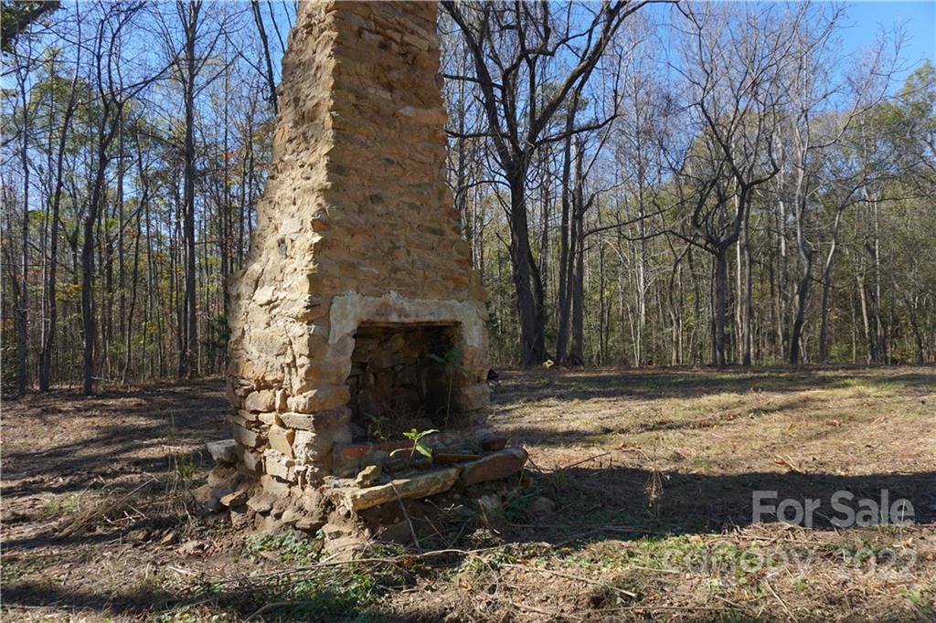 10.64-ac Burree Road Clover, SC 29710 - Photo 7 of 18 a view of fire pit with large trees