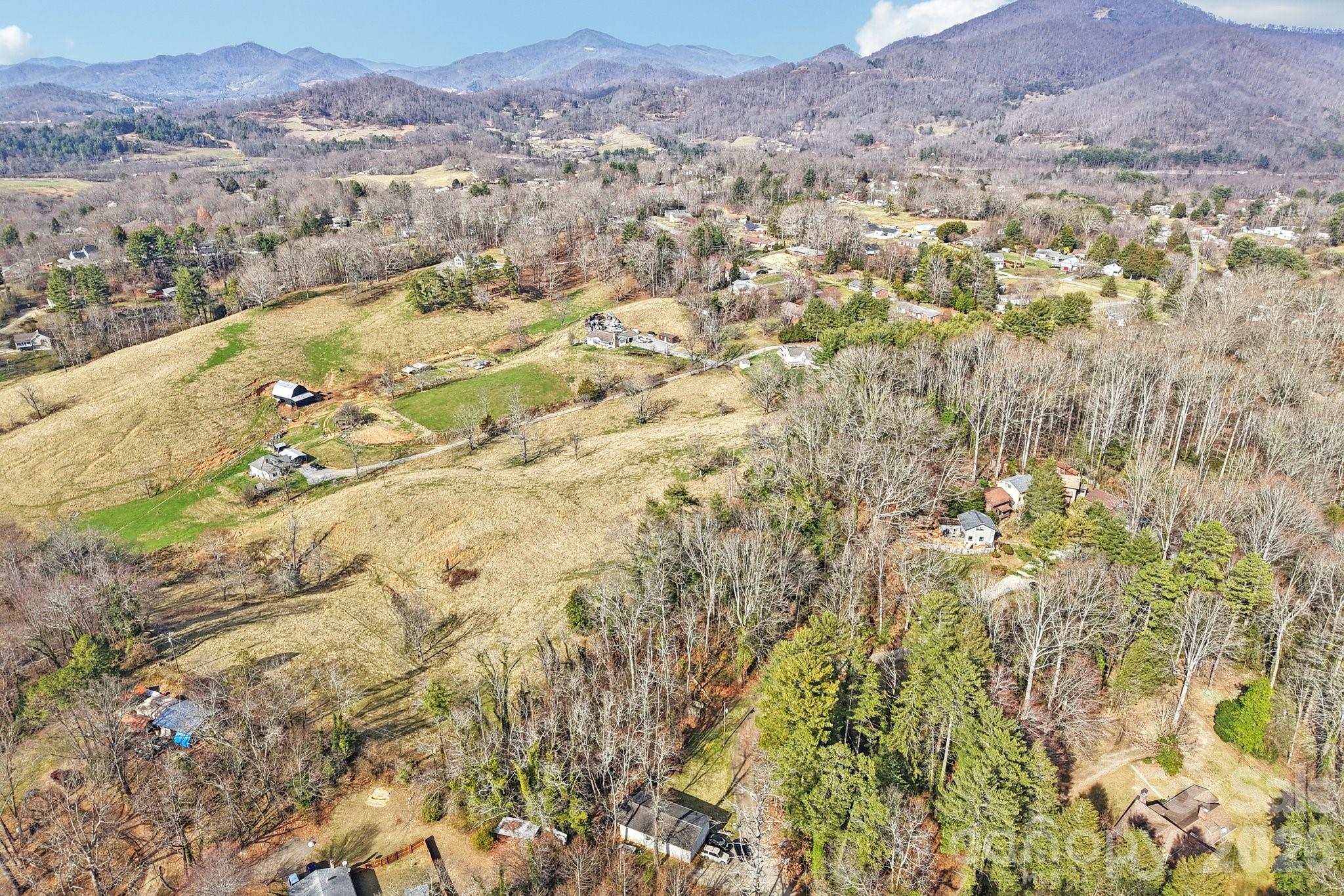 97-99 Forest Drive Clyde, NC 28721 - Photo 8 of 11 a view of city and mountain
