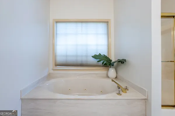 a bathroom with a bathtub