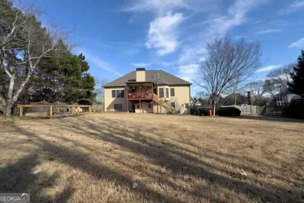 a view of a town with large trees