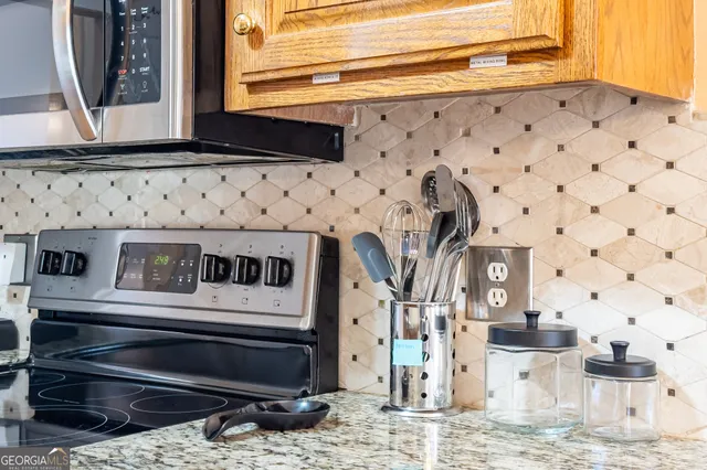 a view of a fireplace with wooden floor
