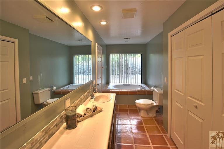 78491 Avenue 41 Bermuda Dunes, CA 92203 - Photo 11 of 16 a spacious bathroom with a tub and shower