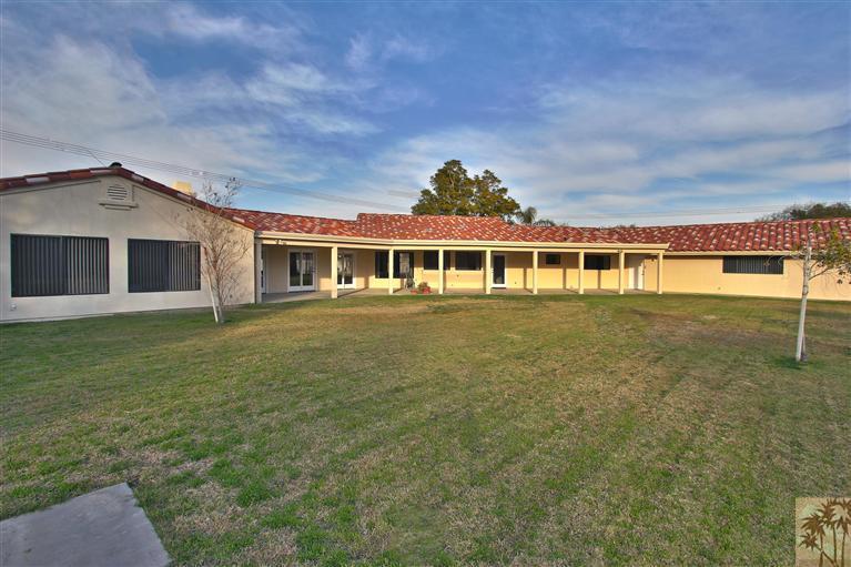 78491 Avenue 41 Bermuda Dunes, CA 92203 - Photo 2 of 16 a view of a house with a yard