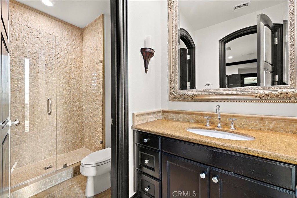 2 Galaxy Isle Ladera Ranch, CA 92694 - Photo 43 of 69 a bathroom with a sink a toilet and shower