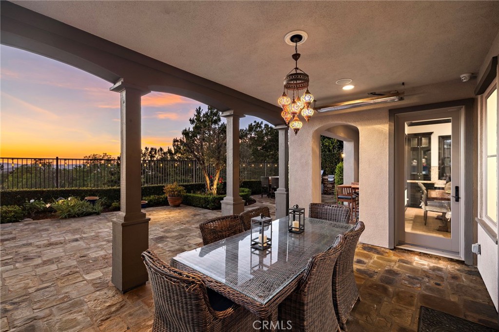 2 Galaxy Isle Ladera Ranch, CA 92694 - Photo 47 of 69 a view of a dining room with furniture wooden floor and chandelier