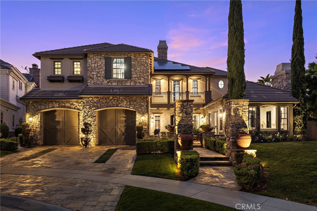 2 Galaxy Isle Ladera Ranch, CA 92694 - Photo 61 of 69 a front view of a house with a yard