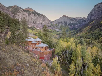a view of a house with a mountain and a mountain view