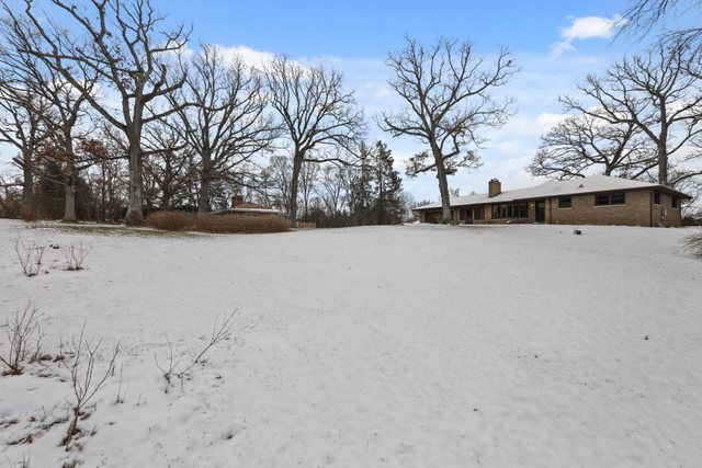 28W777 Garys Mill Road Winfield, IL 60190 - Photo 30 of 47 a view of mountain covered with snow in front of house