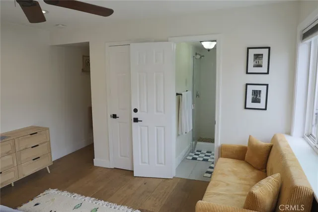a kitchen with a refrigerator sink stove and cabinets