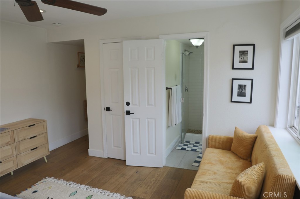160 Avenida Florencia, Unit B San Clemente, CA 92672 - Photo 20 of 48 a living room with furniture and a walk in closet