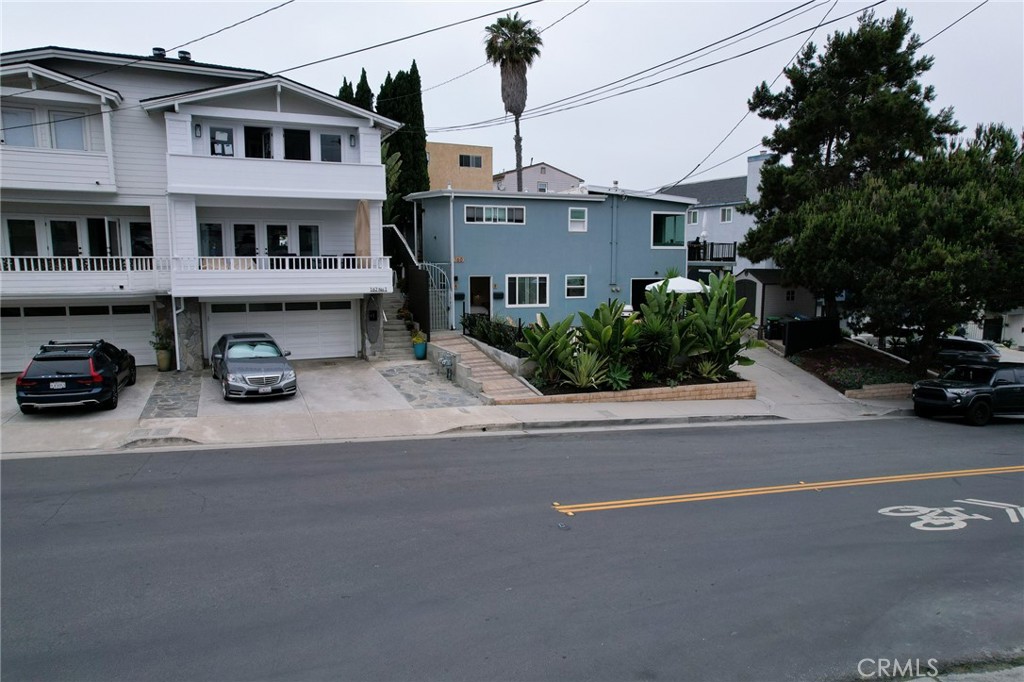 160 Avenida Florencia, Unit B San Clemente, CA 92672 - Photo 30 of 48 a view of a street with cars