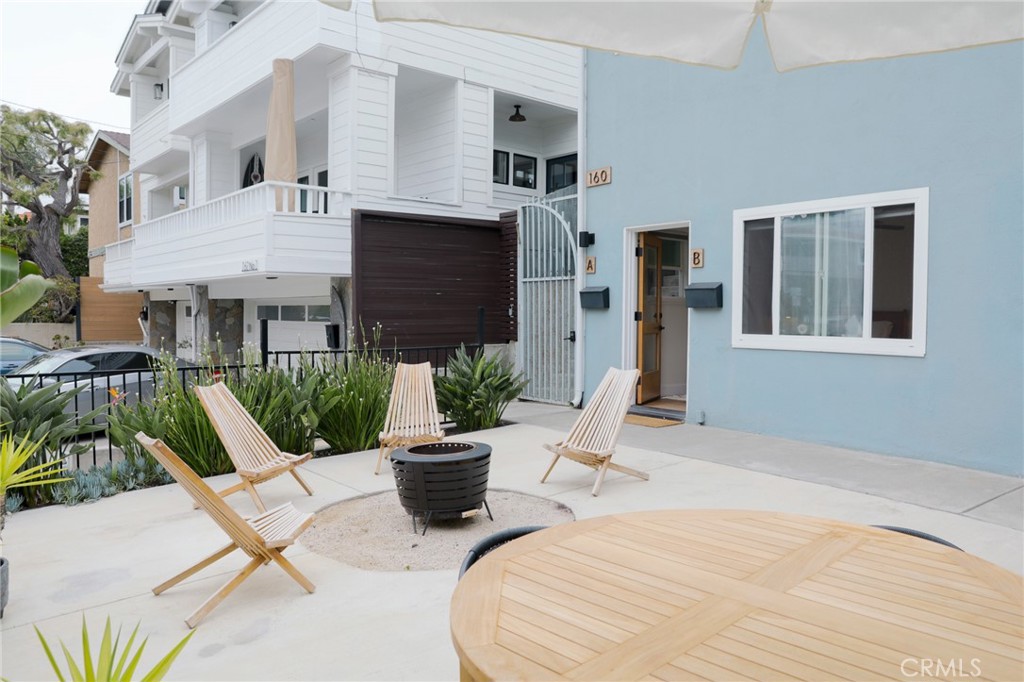 160 Avenida Florencia, Unit B San Clemente, CA 92672 - Photo 3 of 48 a view of a house with backyard and sitting area