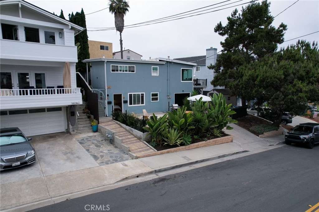 160 Avenida Florencia, Unit B San Clemente, CA 92672 - Photo 31 of 48 a front view of a house with garden