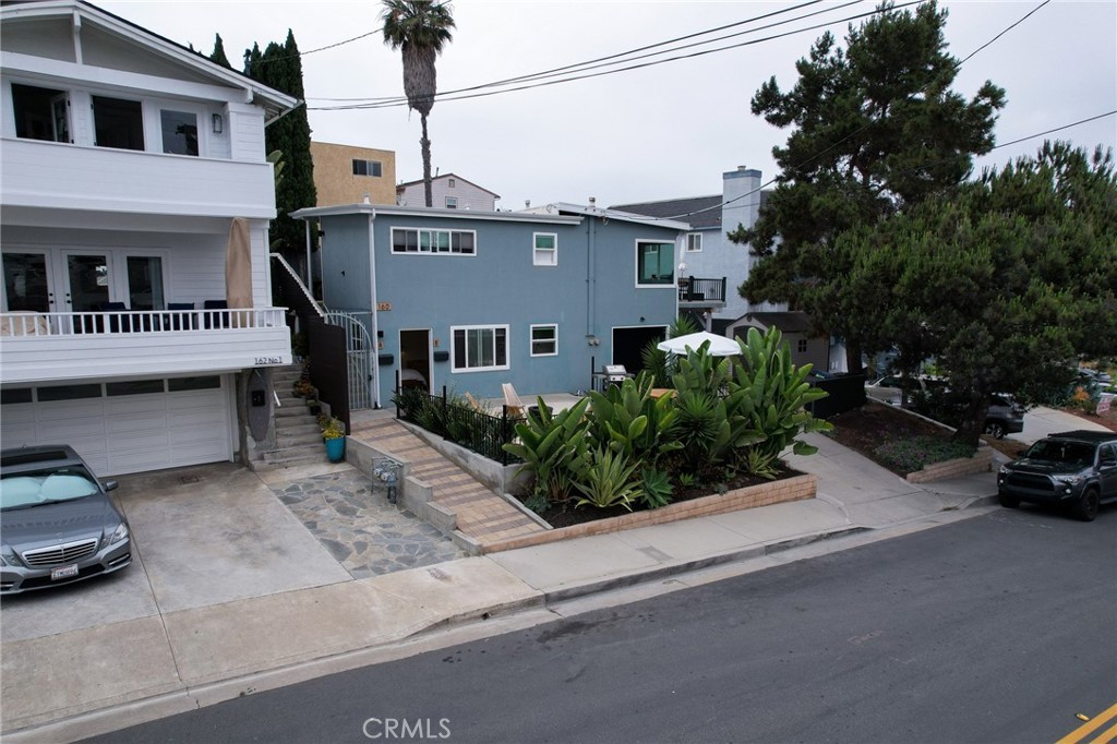 160 Avenida Florencia, Unit B San Clemente, CA 92672 - Photo 32 of 48 a front view of a house with garden