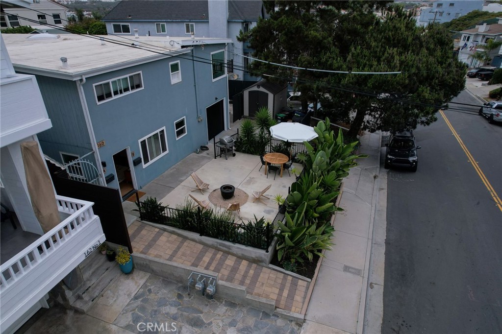 160 Avenida Florencia, Unit B San Clemente, CA 92672 - Photo 39 of 48 an aerial view of a house with swimming pool and porch with furniture