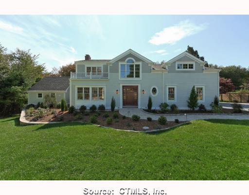 308 Ferry Road Old Lyme, CT 06371 - Photo 1 of 1 a front view of a house with a garden and plants