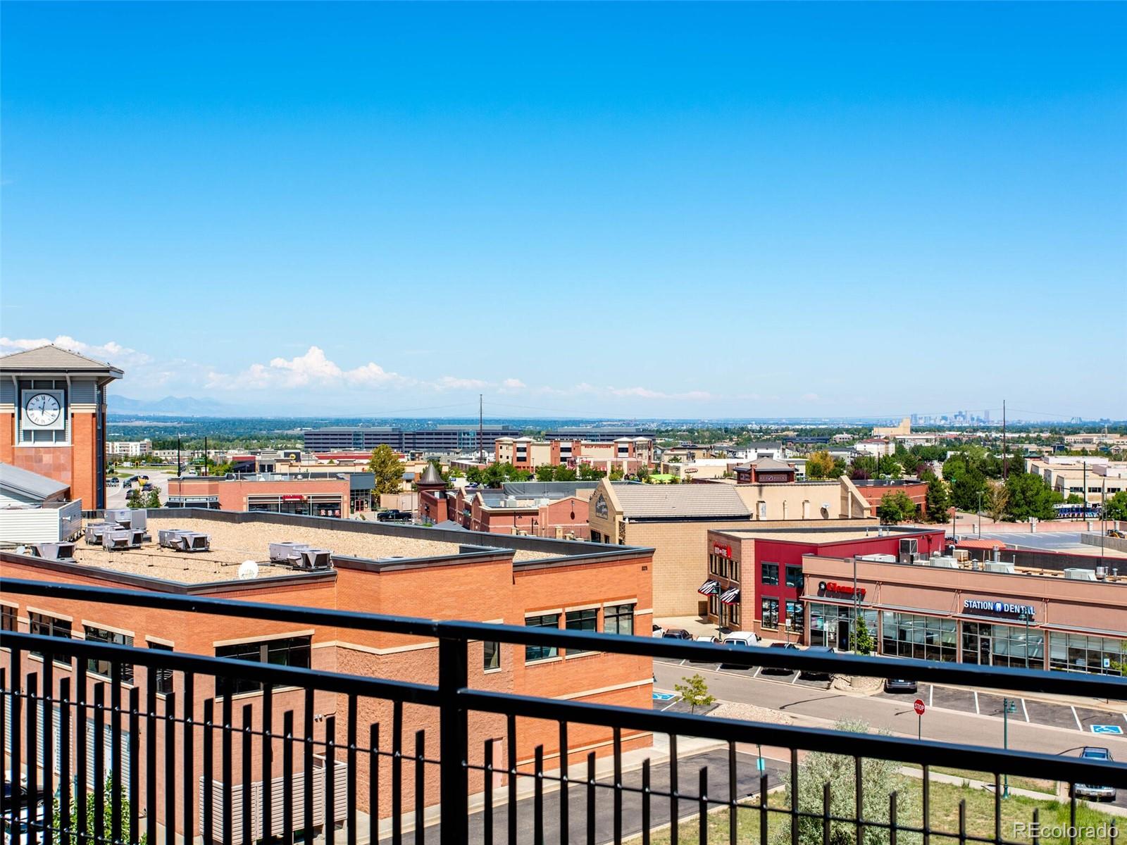 9258 Rockhurst Street, Unit 405 Highlands Ranch, CO 80129 - Photo 25 of 32 a city view from a balcony
