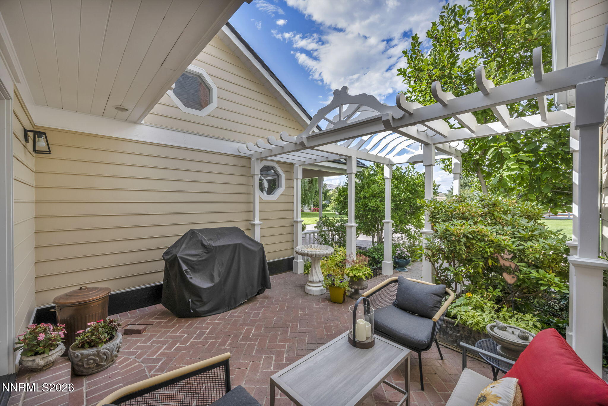 4010 Canyon Drive Reno, NV 89519 - Photo 131 of 147 a view of a patio with table and chairs and potted plants