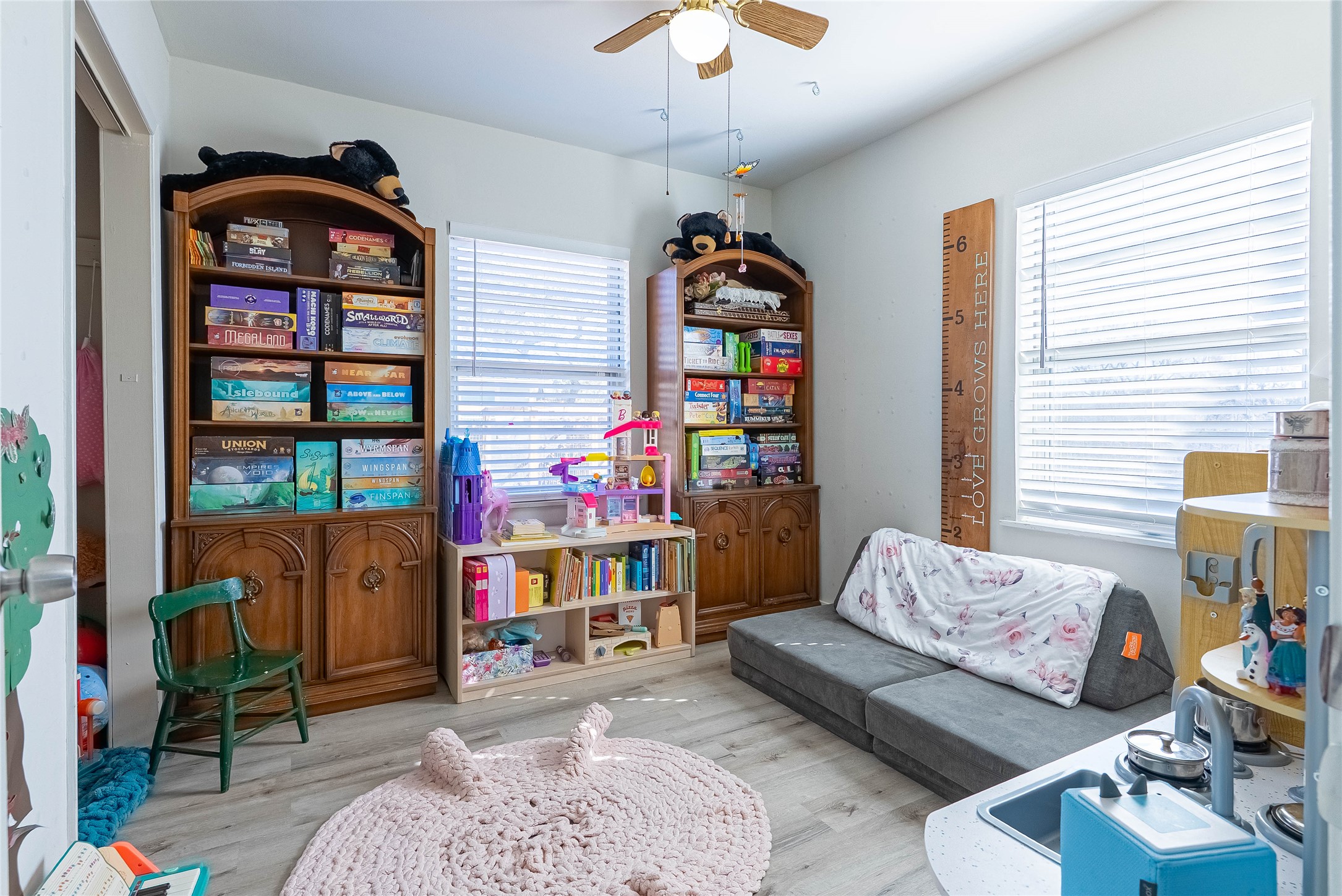 11010 3rd Street Jonestown, TX 78645 - Photo 14 of 20 Secondary bedroom with cozy charm and modern updates
