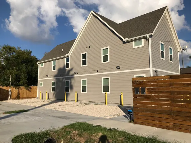 a black and white photo of a refrigerator