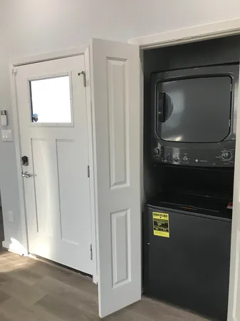 a kitchen with wooden cabinets and a sink