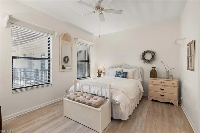 a bathroom with a sink a mirror and a shower