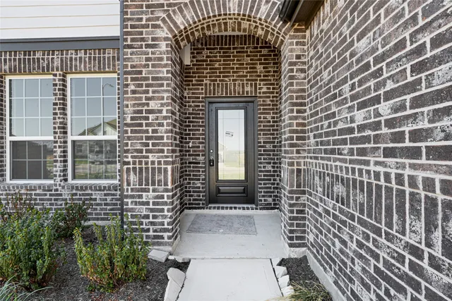 a view of a brick wall of the building