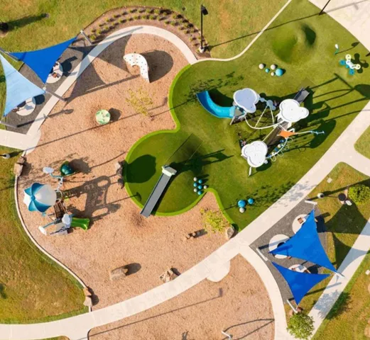 a view of a swimming pool with an ocean view