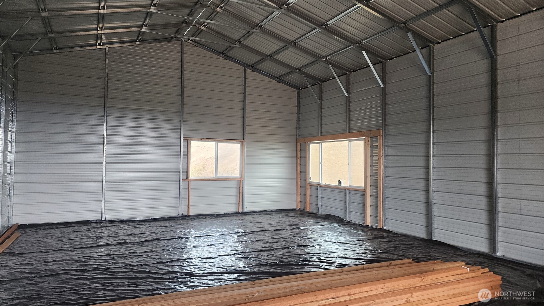 295 Oak Flat Road Goldendale, WA 98620 - Photo 2 of 11 a view of empty room with wooden floor