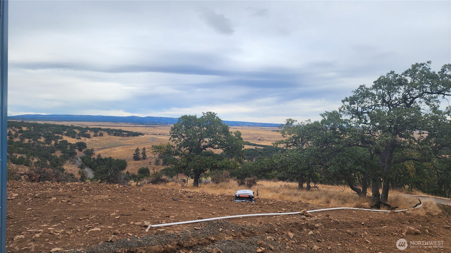 295 Oak Flat Road Goldendale, WA 98620 - Photo 4 of 11 a view of a town with trees