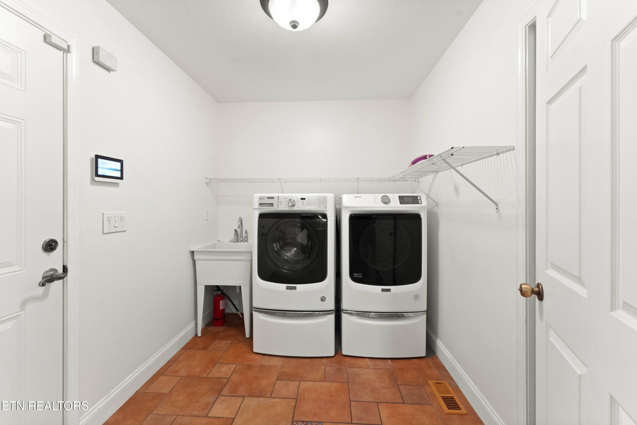 109 Markham Lane Crossville, TN 38558 - Photo 14 of 38 a utility room with dryer and washer