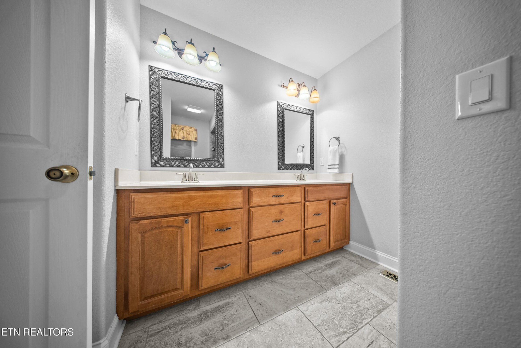 109 Markham Lane Crossville, TN 38558 - Photo 18 of 38 a bathroom with a granite countertop sink and a mirror