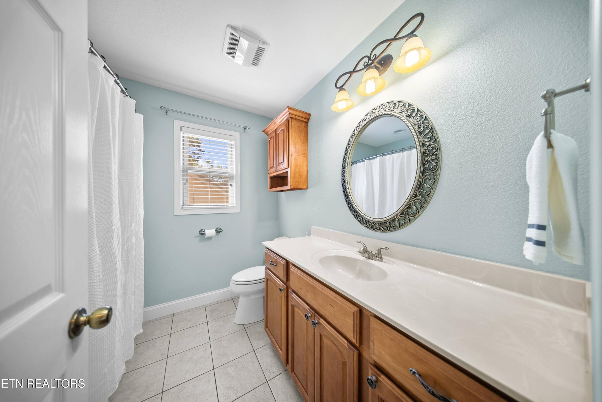 109 Markham Lane Crossville, TN 38558 - Photo 26 of 38 a bathroom with a sink and a mirror
