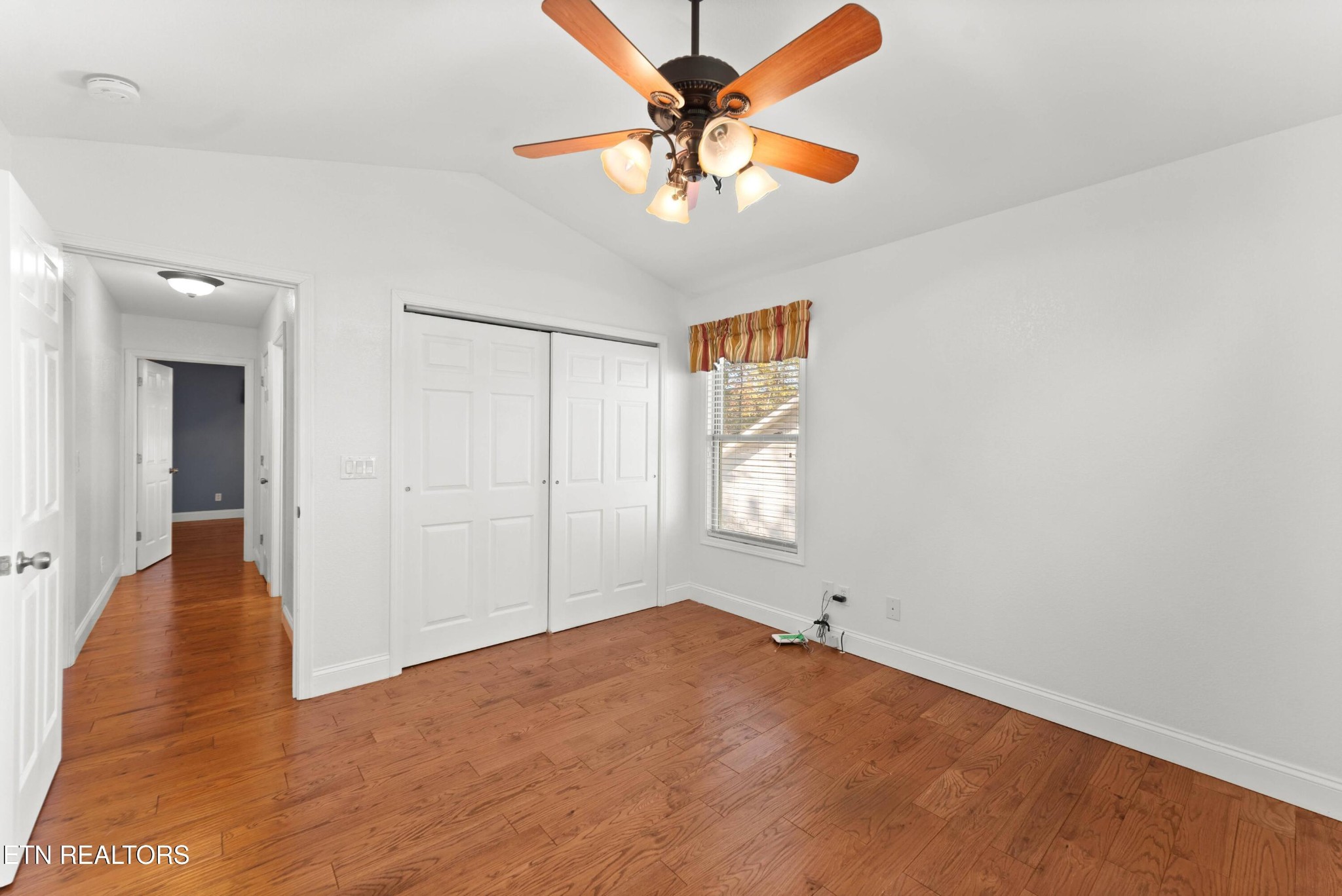109 Markham Lane Crossville, TN 38558 - Photo 28 of 38 wooden floor in an empty room with a window
