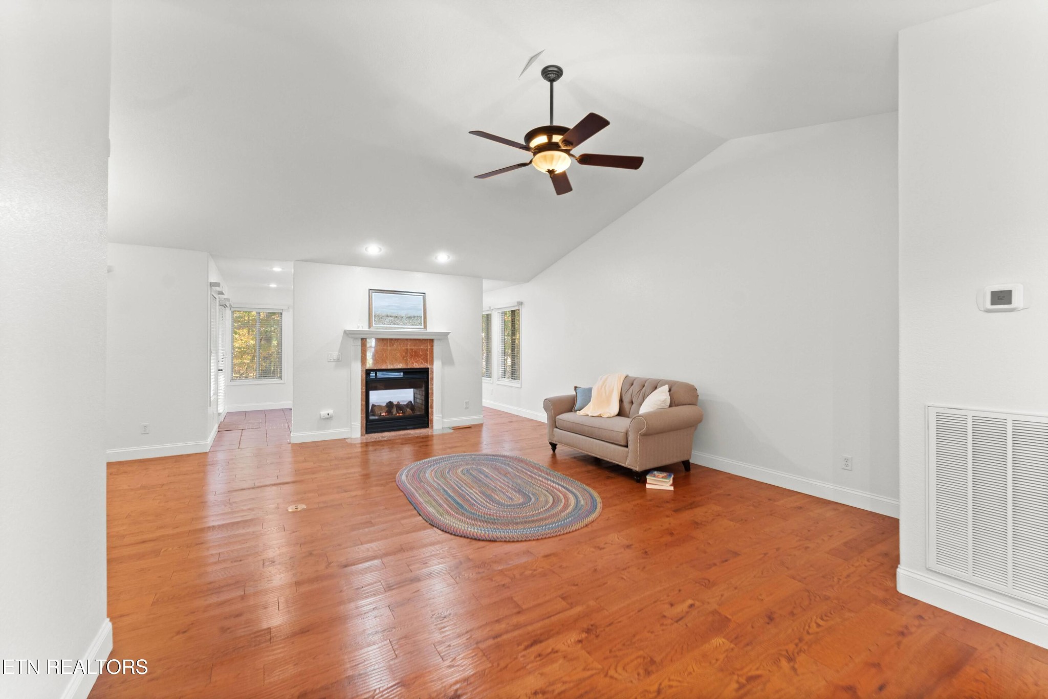 109 Markham Lane Crossville, TN 38558 - Photo 29 of 38 a living room with furniture and a wooden floor