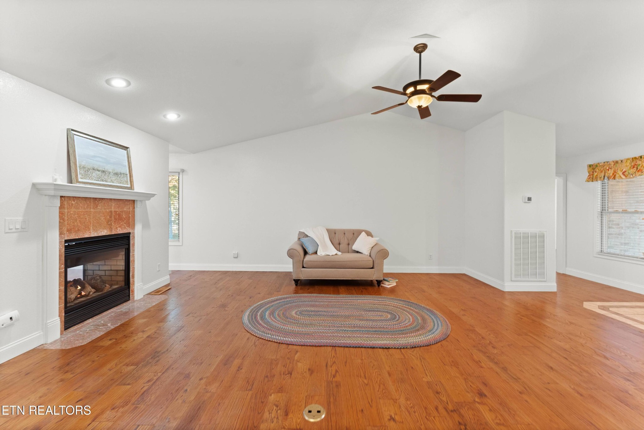 109 Markham Lane Crossville, TN 38558 - Photo 6 of 38 a living room with furniture and a fireplace