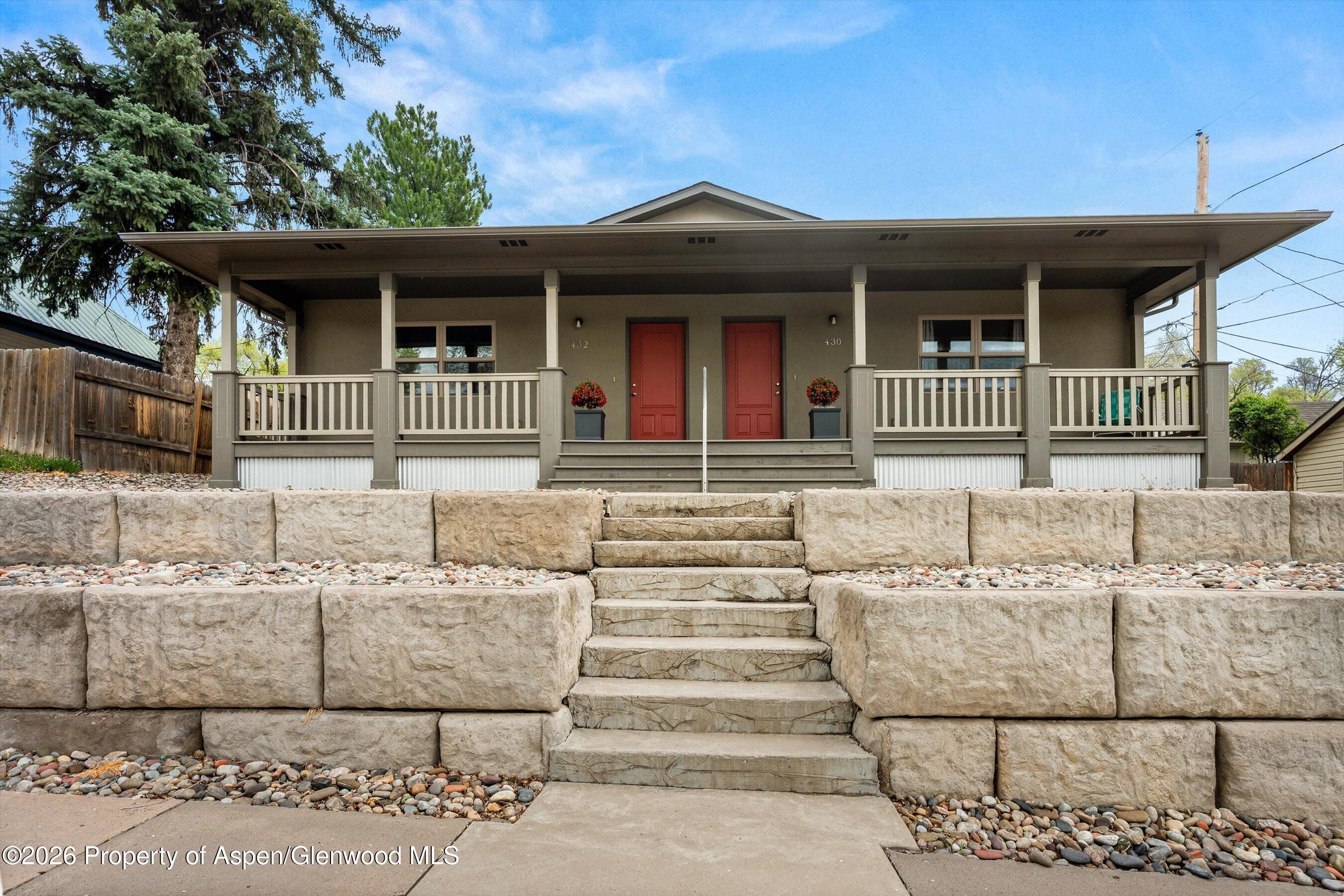 430-432 Whiteriver Avenue Rifle, CO 81650 - Photo 1 of 27 a front view of a house