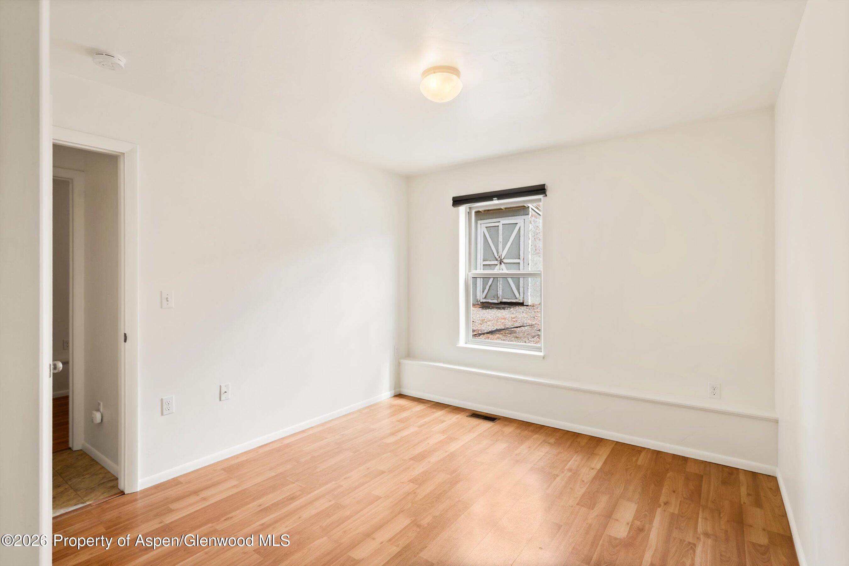 430-432 Whiteriver Avenue Rifle, CO 81650 - Photo 20 of 27 an empty room with windows
