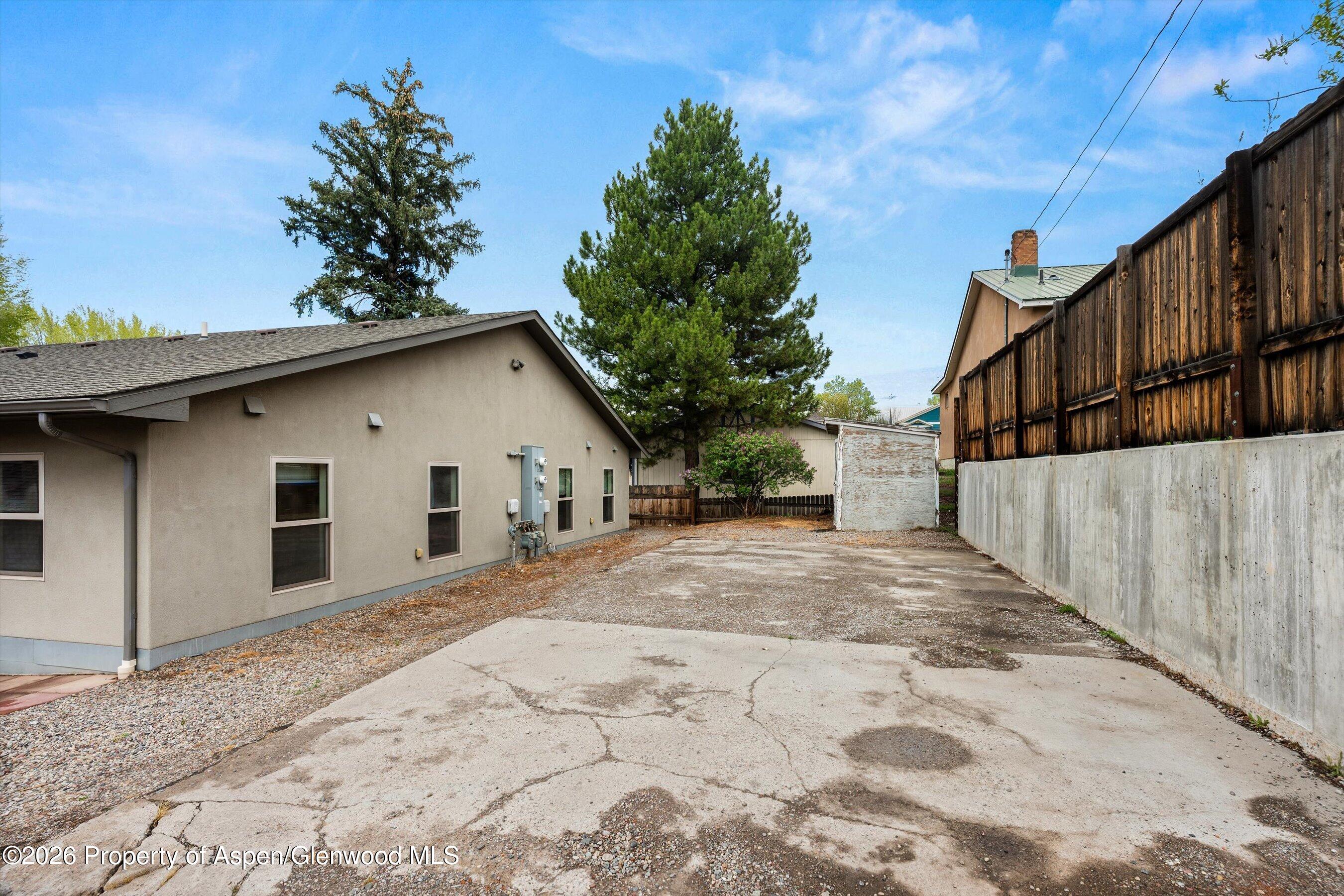 430-432 Whiteriver Avenue Rifle, CO 81650 - Photo 26 of 27 a view of a house with a yard