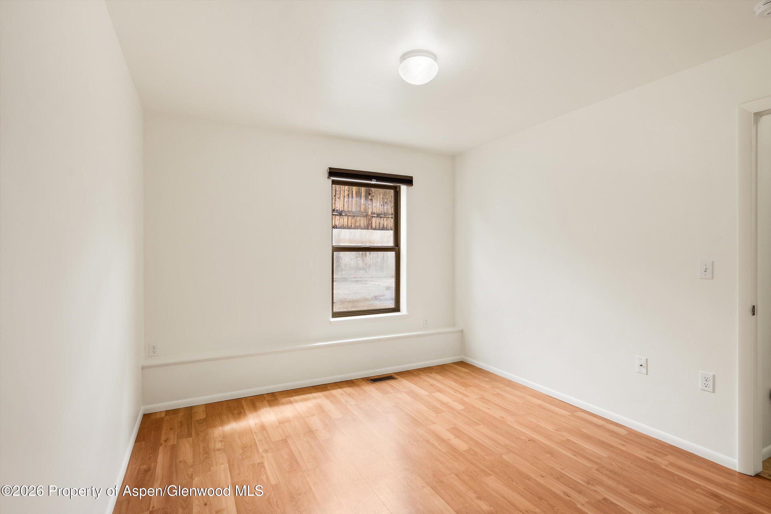 430-432 Whiteriver Avenue Rifle, CO 81650 - Photo 9 of 27 an empty room with a window