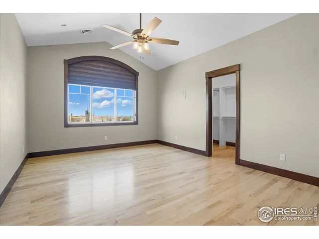 a kitchen with a refrigerator and a view of kitchen